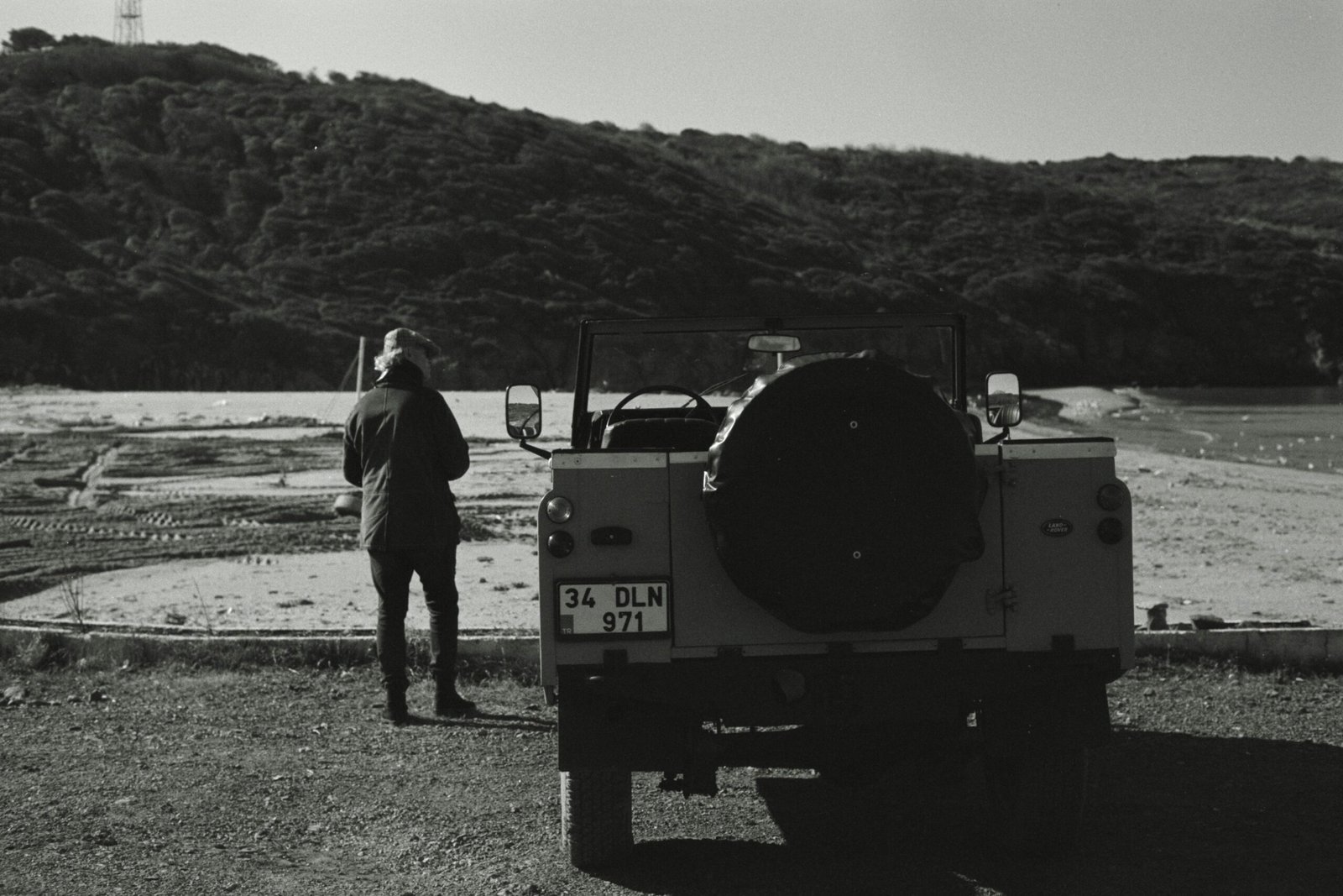 a man standing next to a large machine