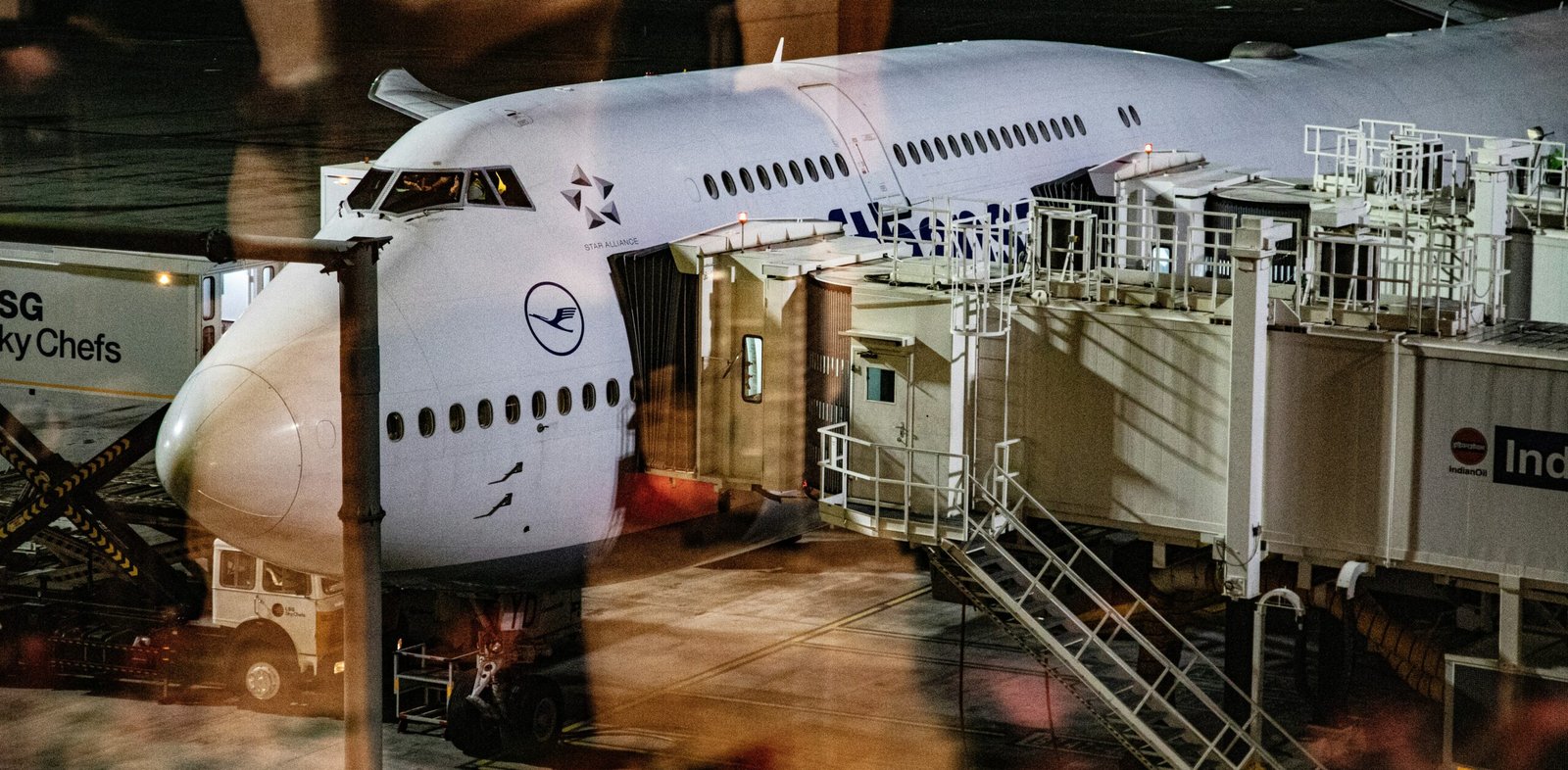 a large jetliner sitting on top of an airport tarmac