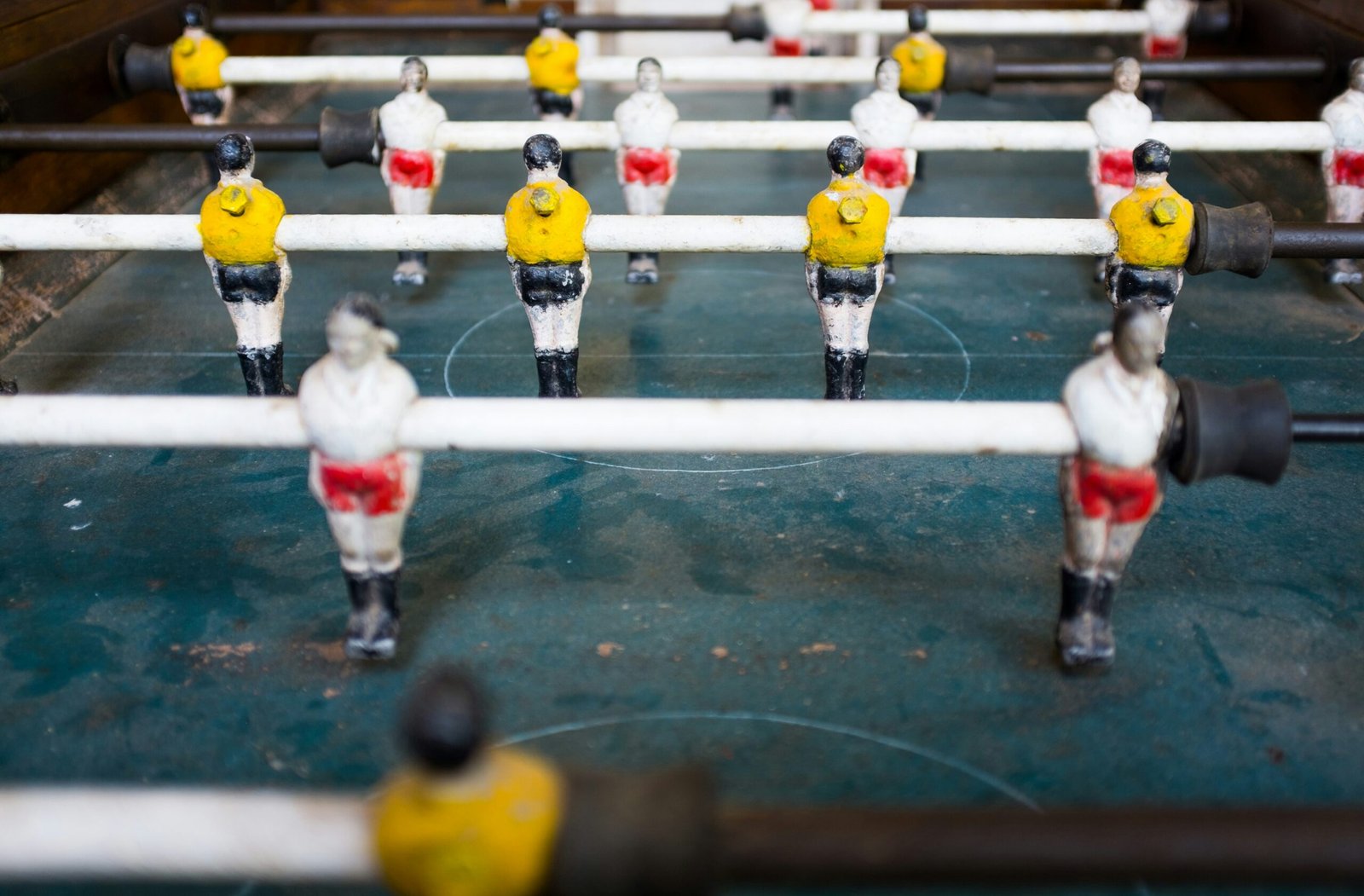 selective focus photography foosball table