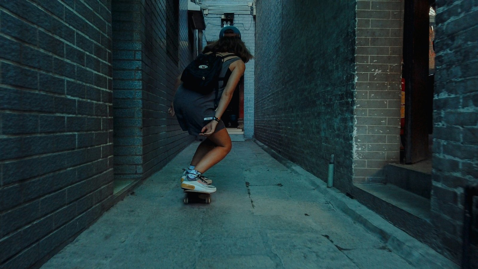 woman riding skateboard