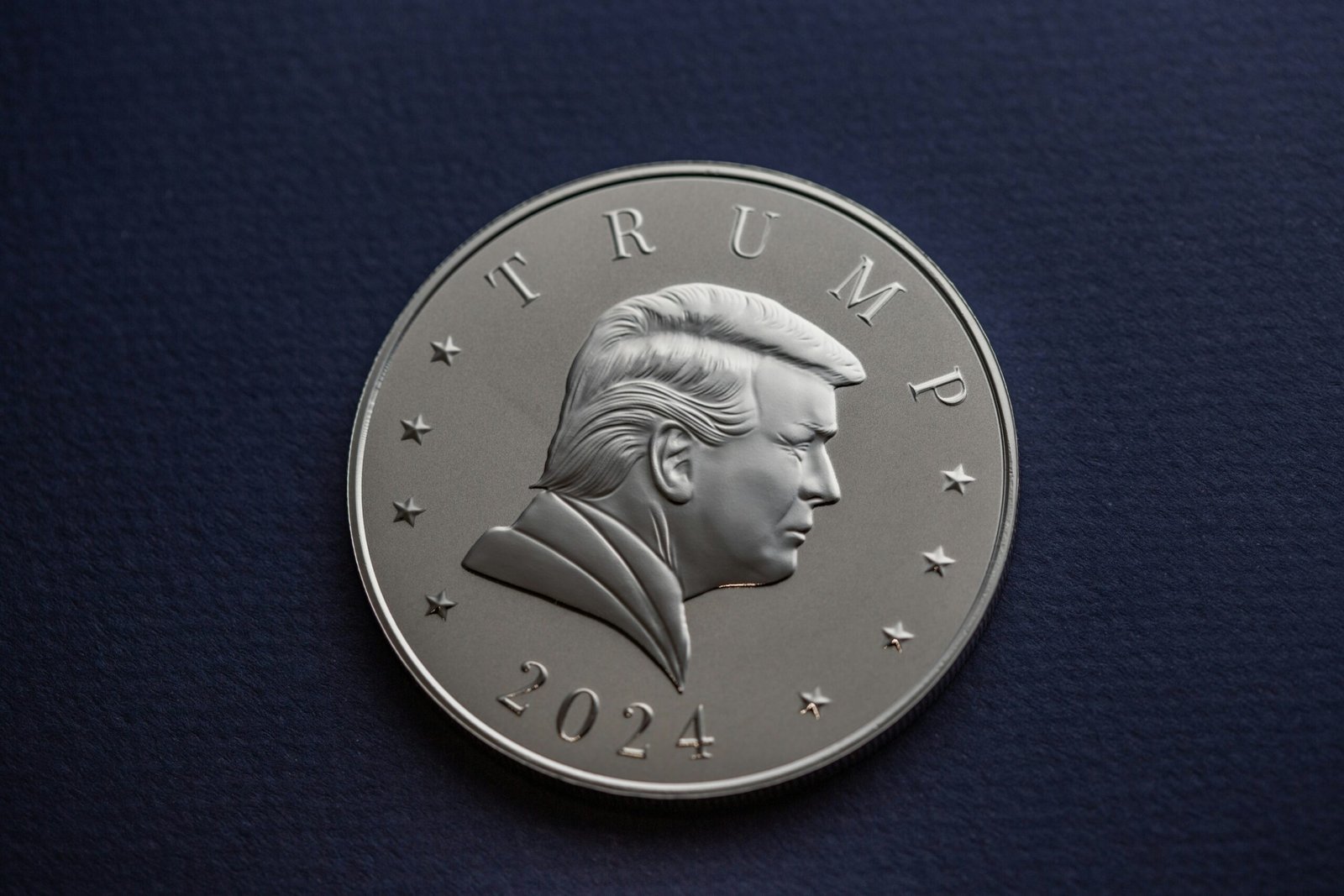 a close up of a coin on a table