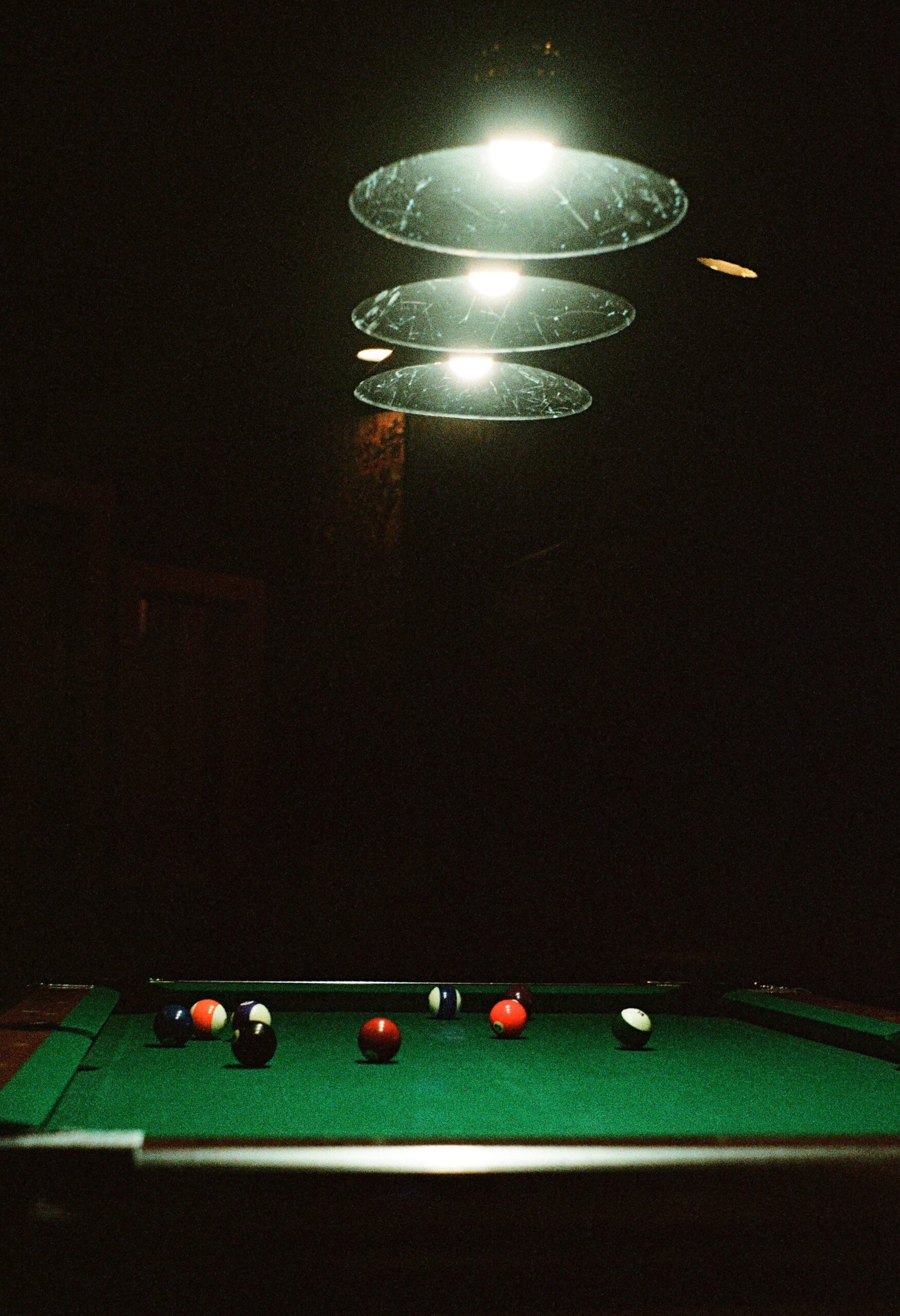 a pool table with a pool ball on it